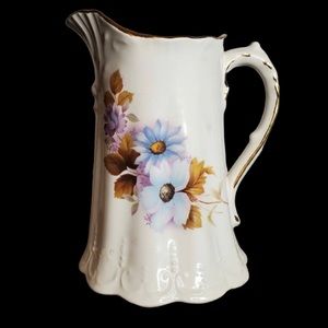 Vintage House of Webster milk Pitcher.   Floral design with gold trim